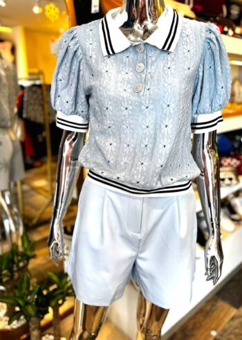 mar_00087 Blusa polo con aplicación